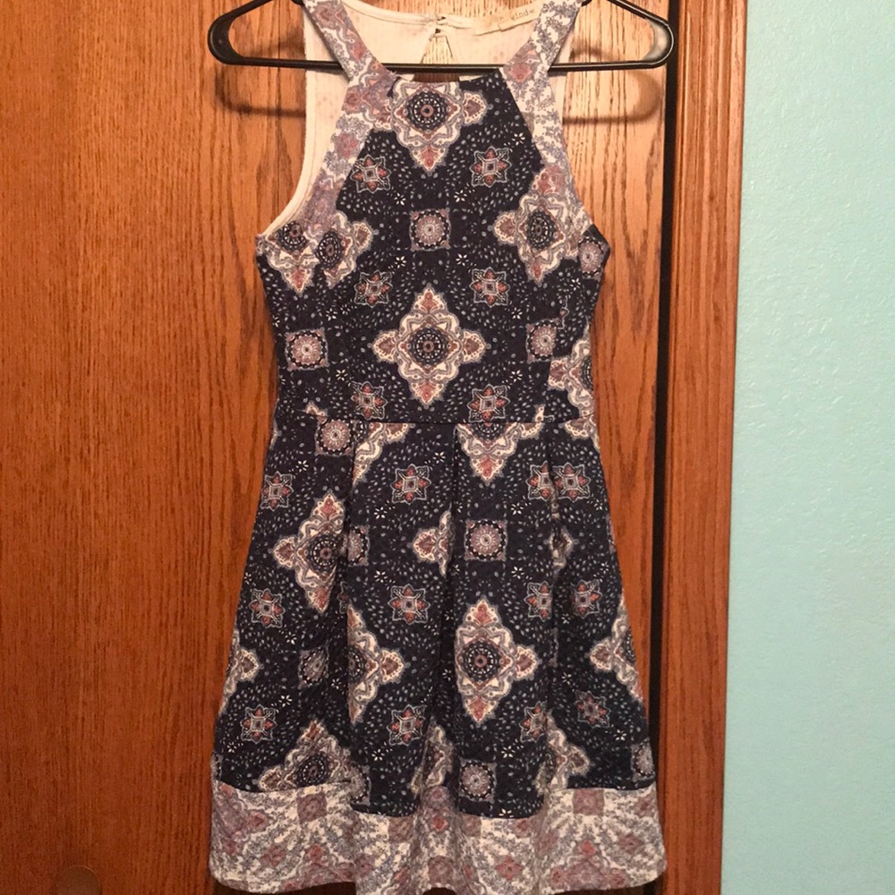 Patterned blue dress with a keyhole back.